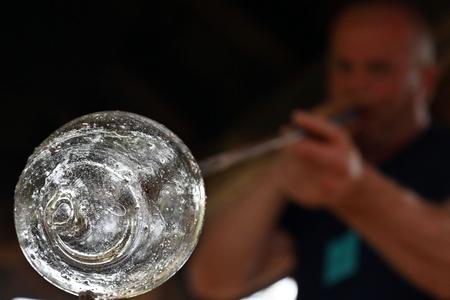 PHOTO OF THE WEEK: Glass master Marek Vanko melts and experiments with glass in an historical glass furnace from the 9th century in the Archeopark in Hanušovce nad Topľou, Prešov Region, in late July 2020. 