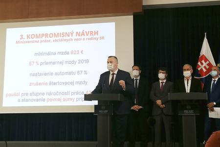 Labour Minister Milan Krajniak (Sme Rodina) introducing the compromise minimum wage proposal.  