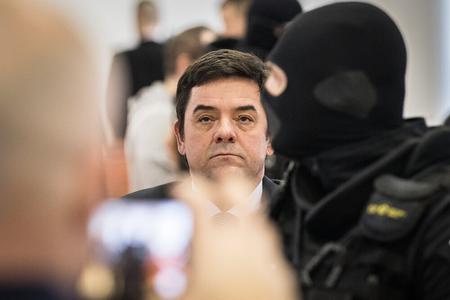 Marian Kočner is escorted to the courtroom.