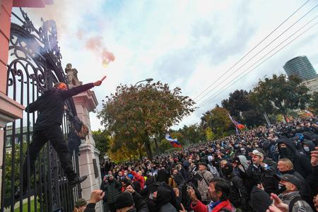 Unauthorised protest against COVID-19 measures turns violent in Bratislava