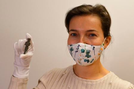Archaeologist Mária Hudáková with the precious Celtic statuette. 