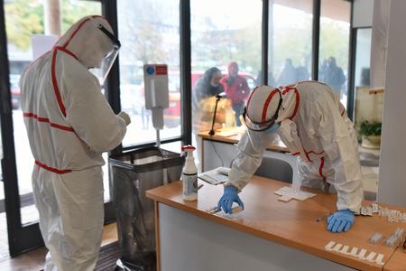 PM and disease experts clash over virus testing