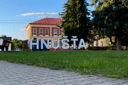 A large "Hnúšťa" sign is installed in the central Slovak town of Hnúšťa.