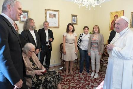 Pope Francis meets with the recalled archbishop Robert Bezák and his family. 