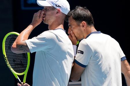 Filip Polášek (l) and Ivan Dodig