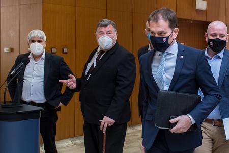 Biochemist Pavol Čekan, infectologist Vladimír Krčméry and PM Igor Matovič before discussing of measures against spread of Covid-19.