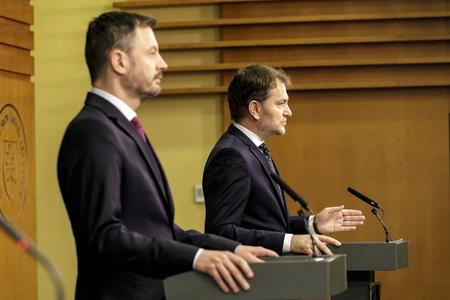 PM Eduard Heger (foreground) and Finance Minister Igor Matovič during a press conference on June 25, 2022.