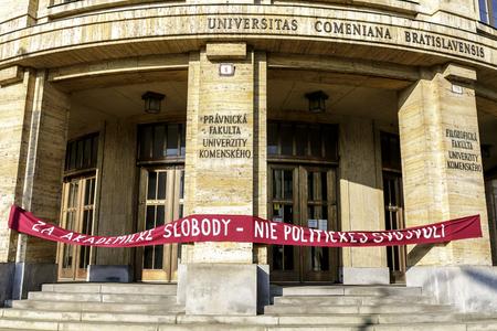 "For Academic Freedom - No to Political Arbitrariness" reads a writing on facade of Comenius University Law Faculty building.