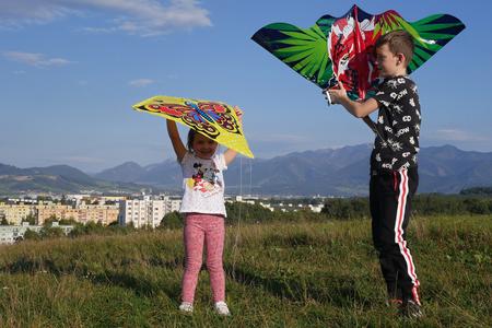 Children flying kites in Žilina.