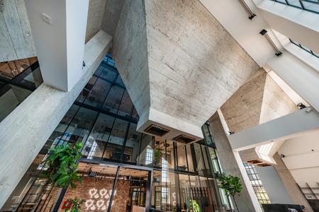 The best place to enjoy the industrial atmosphere of the building is the atrium.
