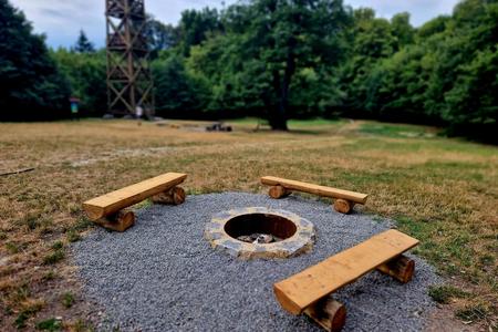 A restored firepit for barbecuing food at American Square, under Kamzík hill.
