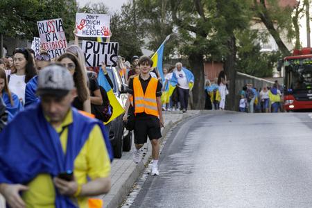 Ukrainian people march in Bratislava on Ukrainian Independence Day on August 24, 2022.
