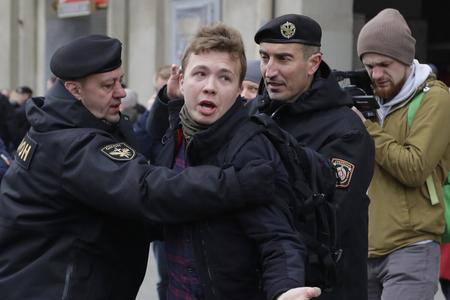Belarus police detained journalist Raman Pratasevich (centre) in Minsk, Belarus, on May 23. 