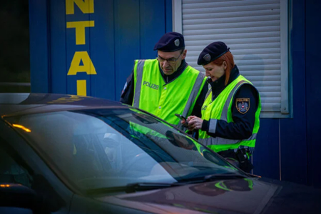 Police checking drivers at the borders. 