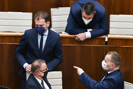 Finance Minister Igor Matovic (left) during the parliamentary session on his first state budget. Boris Kollar (bottom right) and his Sme Rodina did not support the reforms in parliament. 