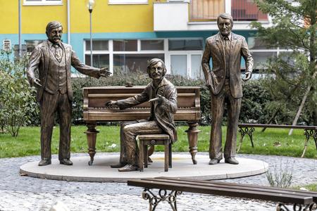 Bronze sculptures of three late Slovak comedians - Milan Lasica (right), Július Satinský (left) and Jaro Filip (middle) on Lužná Street in Petržalka, Bratislava. 