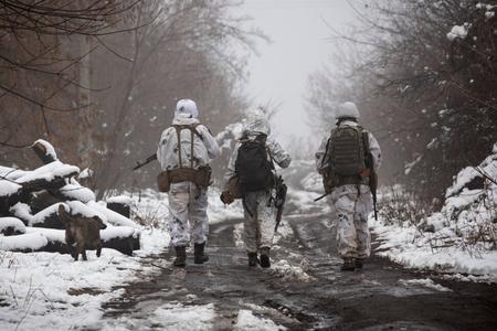 Ukrainian soldiers walking near Donetsk. 