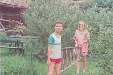 Sarah Hinlicky Wilson and her friend Peter picking cherries in Svätý Jur.  