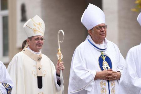 Archbishop Ján Orosch, walking in front of Bratislava Archbishop Stanislav Zvolenský. 