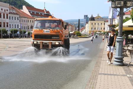 A truck sprays water on the main square in Banská Bystrica on July 7 to cool down the area amid the summer heat.