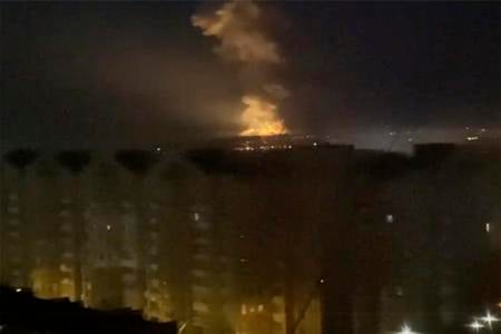 Flames seen from an area near the Dnieper River in Kyiv, Ukraine.