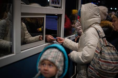 People fleeing war in Ukraine at the border crossing in Vyšné Nemecké, eastern Slovakia. 