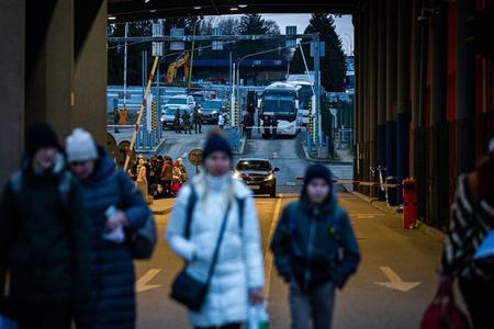 People fleeing war in Ukraine at the border crossing in Vyšné Nemecké, eastern Slovakia. 