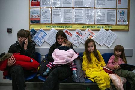 People fleeing war in Ukraine at the border crossing in Vyšné Nemecké, eastern Slovakia. 
