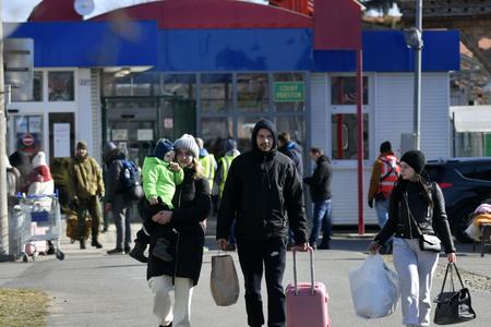Refugees from Ukraine at the pedestrian border crossing in Veľké Slemence, March 1, 2022.