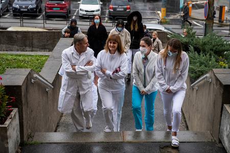 Doctors arrive at a press conference in Bratislava on November 24, 2022.