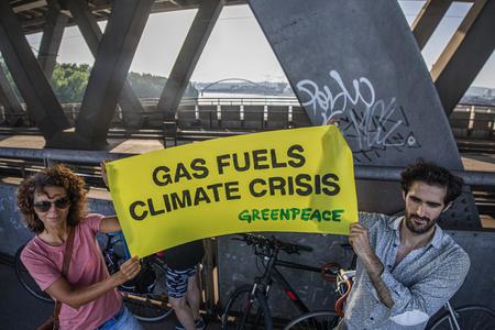 Activists protest against a planned LNG terminal. 