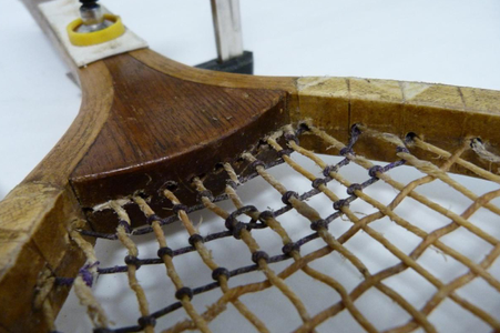 A tennis racket from the 19th century.