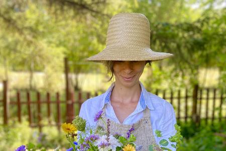 Daniela Baños with one of her flower creations.