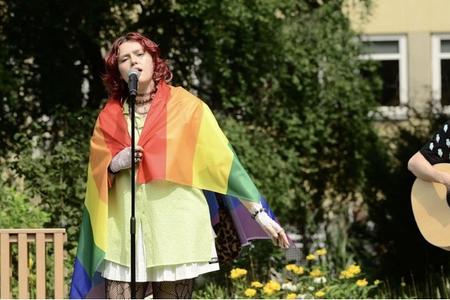 Wrapped up in a rainbow flag, Slovak singer Karin Ann performs "babyboy" on a national TV broadcaster in Poland.