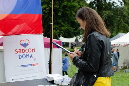 Signing a petition for expanding the possibility to vote in presidential elections from abroad in June 2023.