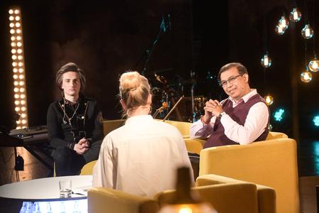 Owen Patrick Fernandes (R) as a guest on the Trochu Inak s Adelou television programme in April 2019.