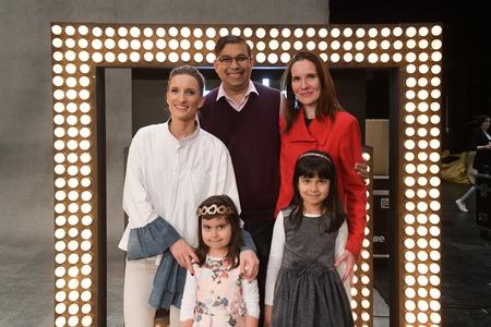 Presenter Adela Vinczeová (L) and Owen Patrick Fernandes with his family in April 2019.