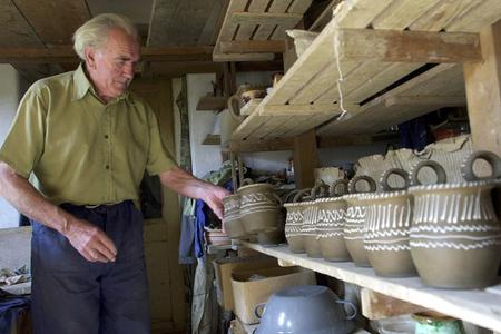 In the picture is Ján Konýves, maker of the Pukanec pottery.