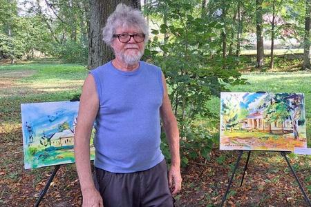 Štefan Galvánek with his pictures in the unique Coburg Park in the village of Pohorelá. The park belonged to the aristocratic family of Coburgs. 