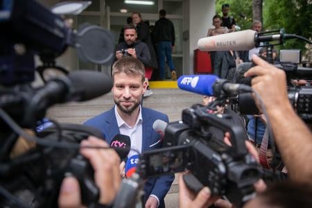 Progresívne Slovensko leader Michal Šimečka talks to journalists on September 30, 2023.