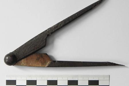 A copper alloy dividers with the remains of iron points found near Pezinok.