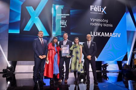 Ľubomír Očenáš, owner of Lukamasiv company, holding the award for 2023.