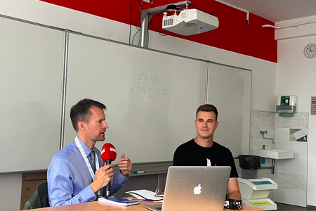 James Thomson and Ľuboš Balažovič Jr. at a Spectator College discussion.
