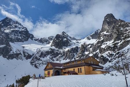 The mountain hut at the Zelené Pleso mountain lake is a popular destination in winter.