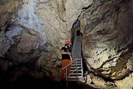 A cave guide in Brestovská Cave.