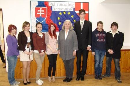 Ambassador Anita Hugau joins students.