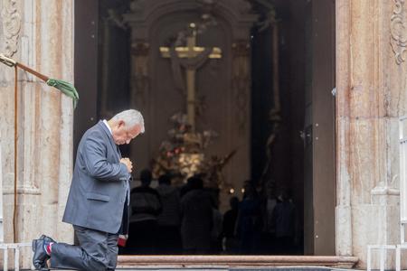 A believer during a mass.