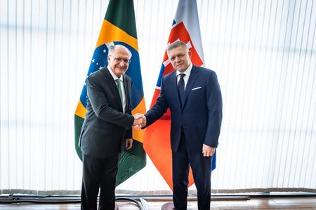 In the photo on the left, PM Robert Fico (Smer-SD) and Brazil's Vice President Geraldo Alckmin shake hands in the capital of the largest South American country - Brazil on December 10, 2024.