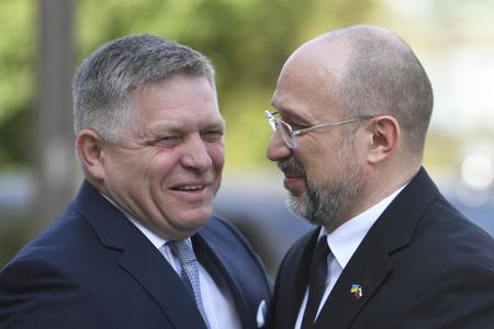 Prime Minister Robert Fico (left) and Prime Minister of Ukraine Denys Shmyhal greet each other ahead of a meeting between members of the Slovak and Ukrainian governments on 11 April 2024 in Michalovce.
