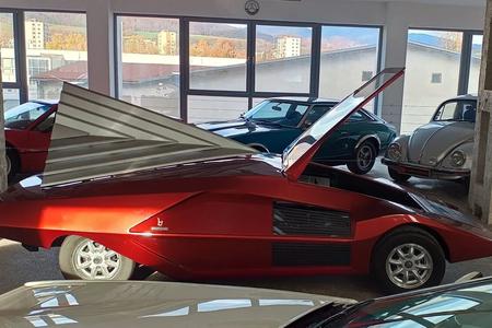 The Lancia Stratos Zero, shown with its engine cover and windscreen/door both in the 'open' position.